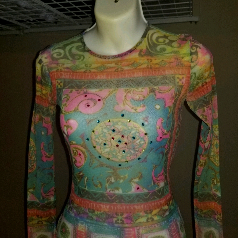 Beautiful sequence and print shirt 100% sheer